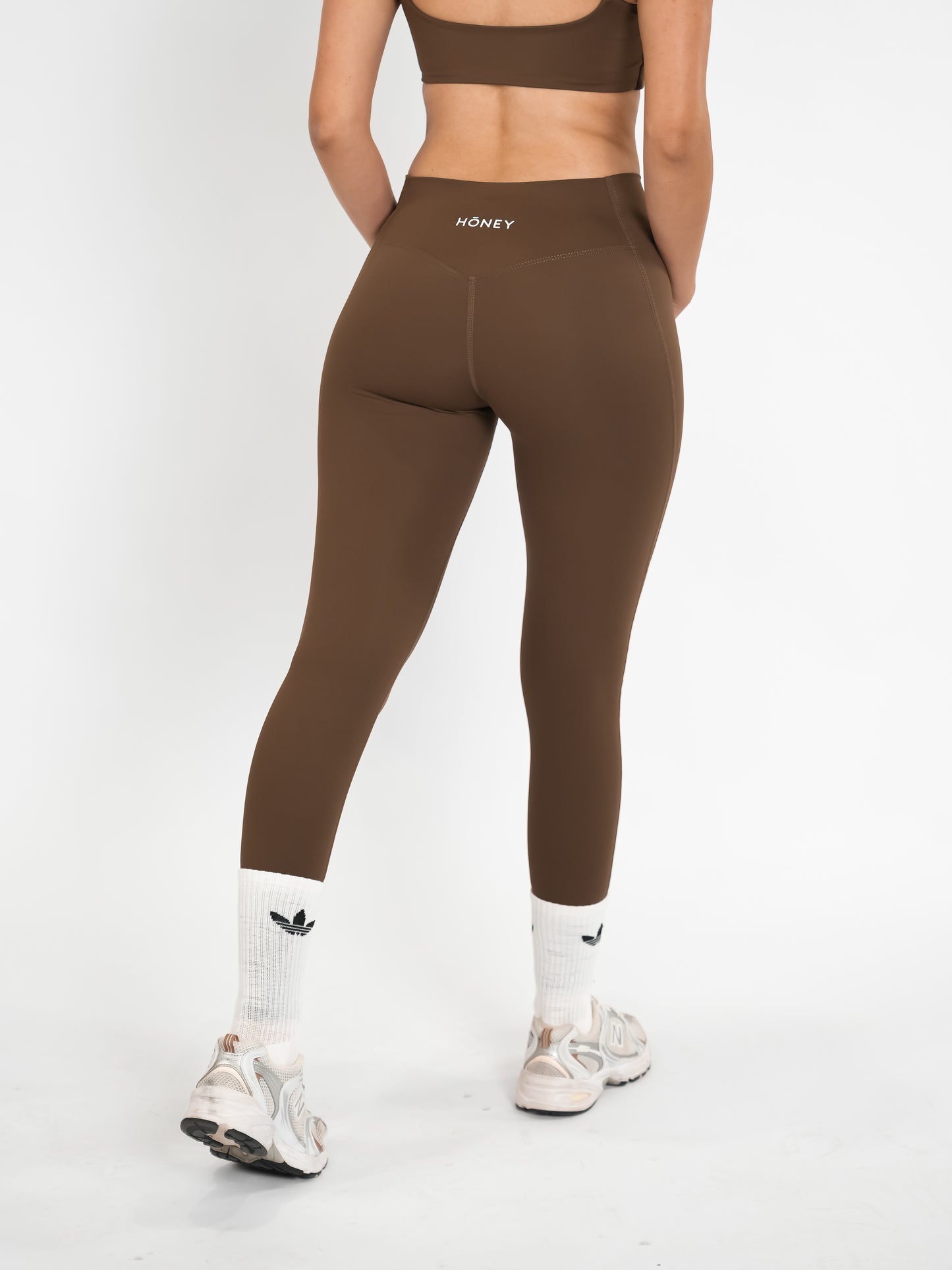 Brown HŌNEY Pilates Leggings.